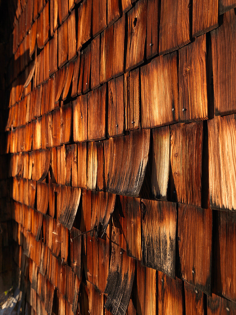 Weathered wooden shingles of a mountain hut, Kallbrunn Alp, Lofer, Salzburger Land, Austria