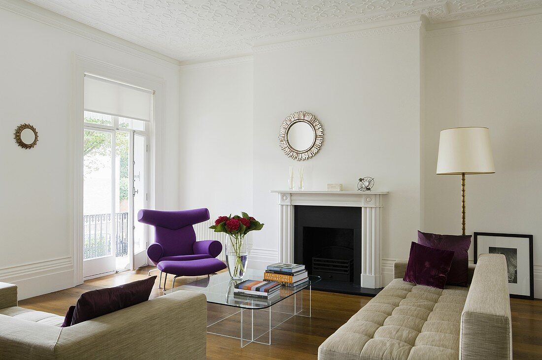 A perfectly designed, elegant living room with a fireplace