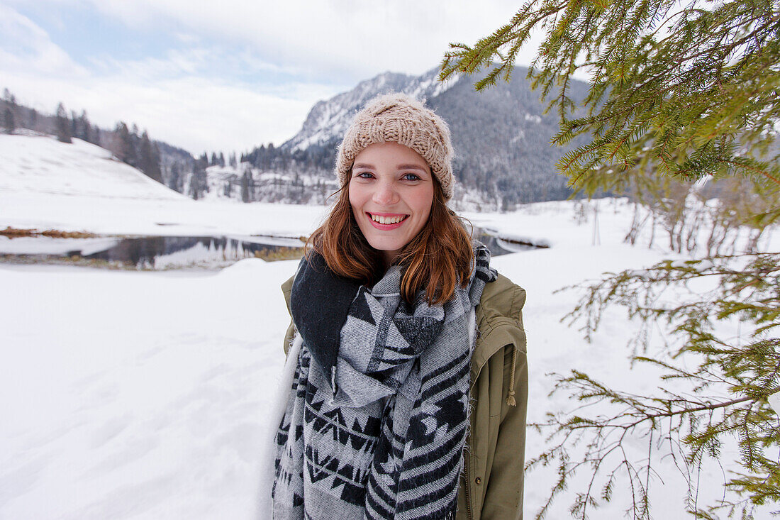 Woman smiling at camera, Spitzingsee, Upper Bavaria, Germany