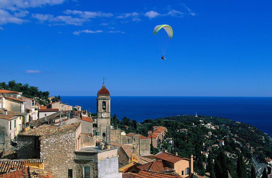 Roquebrune, France, Côte dAzur, Alpes_Maritimes, sea, Mediterranean Sea, village, houses, homes, church, paraglider airman