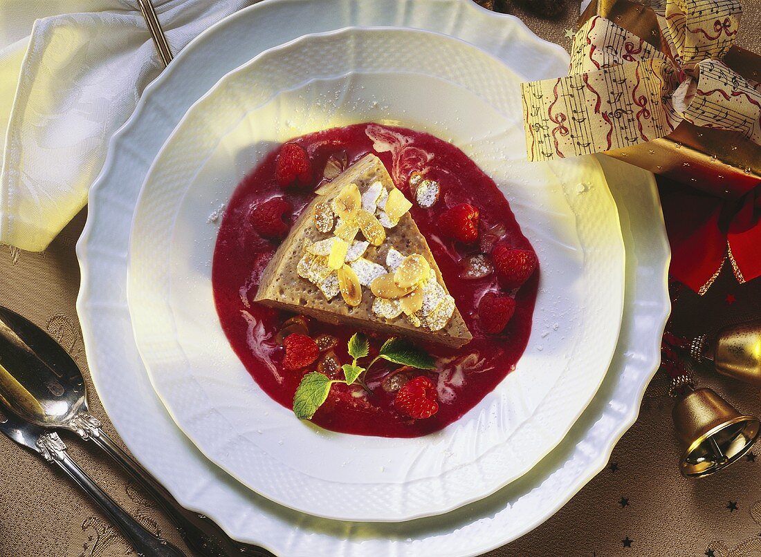 Chocolate and almond flan with raspberry sauce