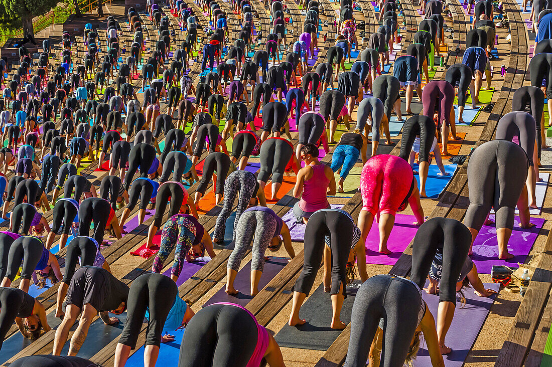 2000 people doing yoga together at Red Rocks Amphitheatre, Morrison (Denver), Colorado USA.