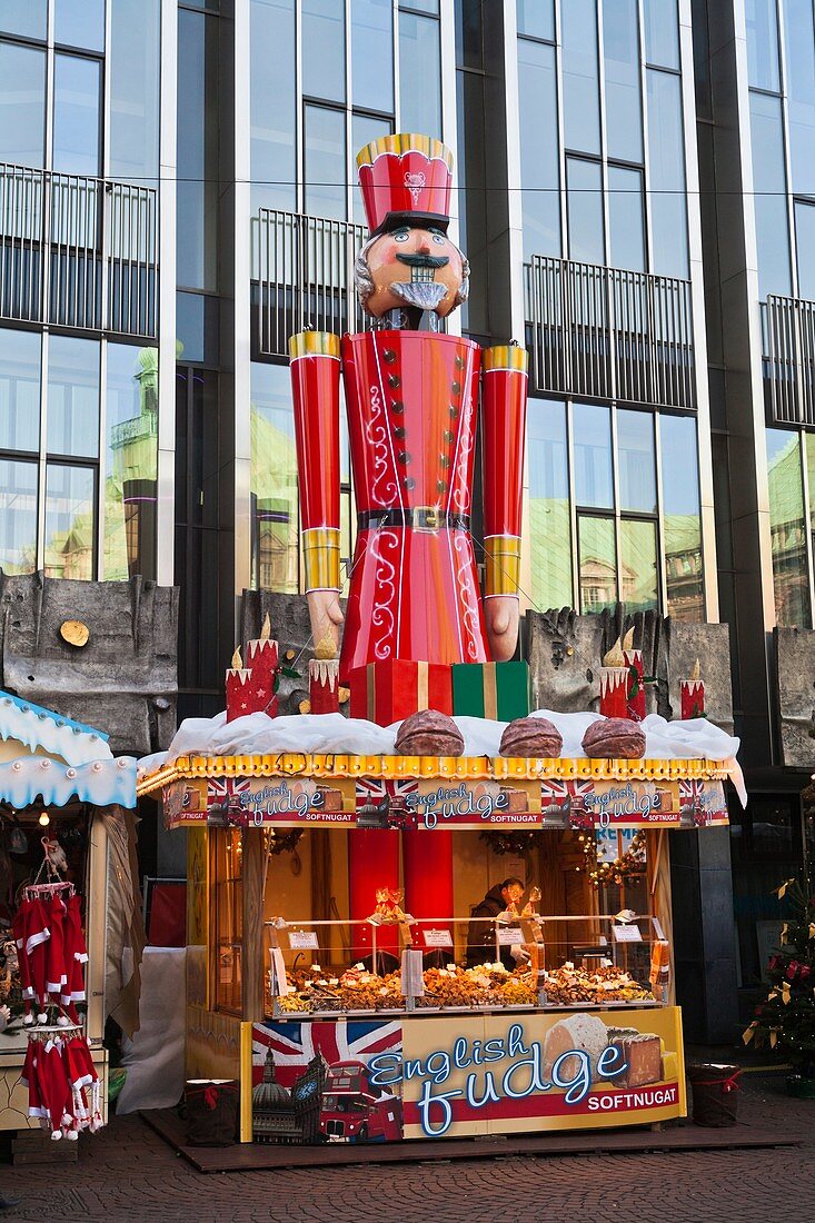 Market stall with a large nutcracker at the christmas market in Bremen, Germany, Europe