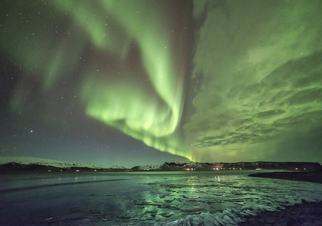 Aurora Borealis or northern Lights during winter at southern Iceland.