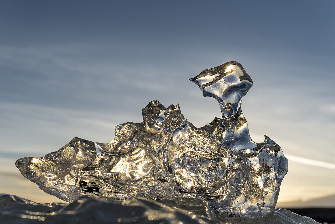 Small icebergs standed on black shore of Jokulsarlon beach. Vatnajokull National Park, Iceland.