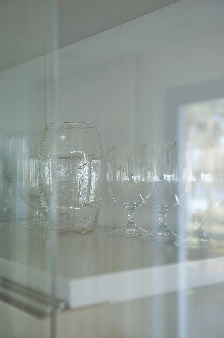 Glassware in cabinet
