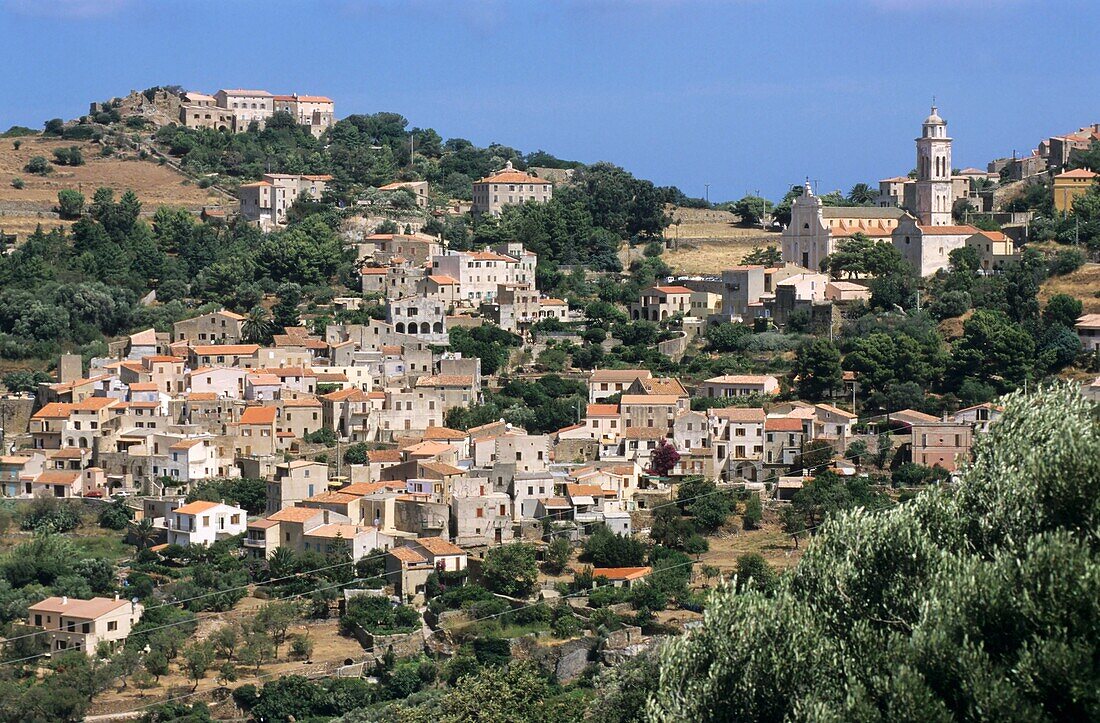 Quaint townscape and hills, Corbara, Corsica, France.