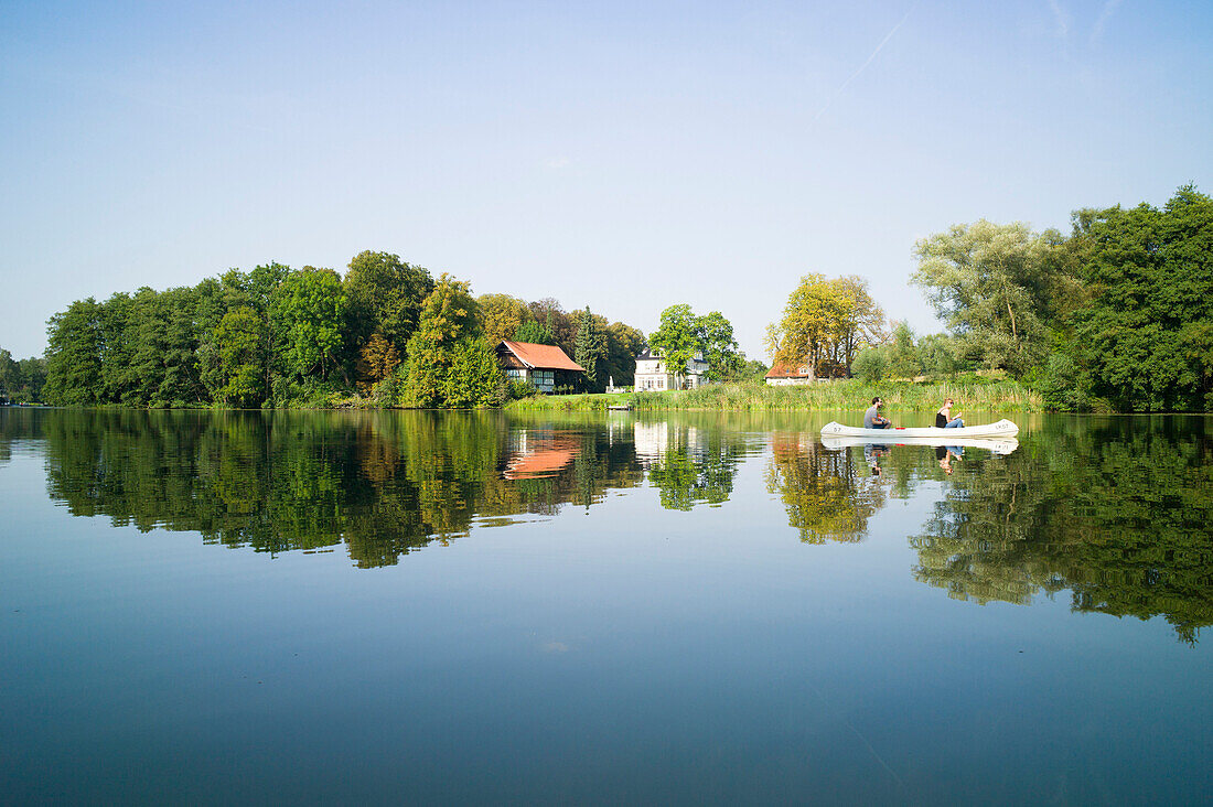 canoeing along the Wakenitz river, area so called Amazona of the North, Luebeck, Schleswig-Holstein, Germany