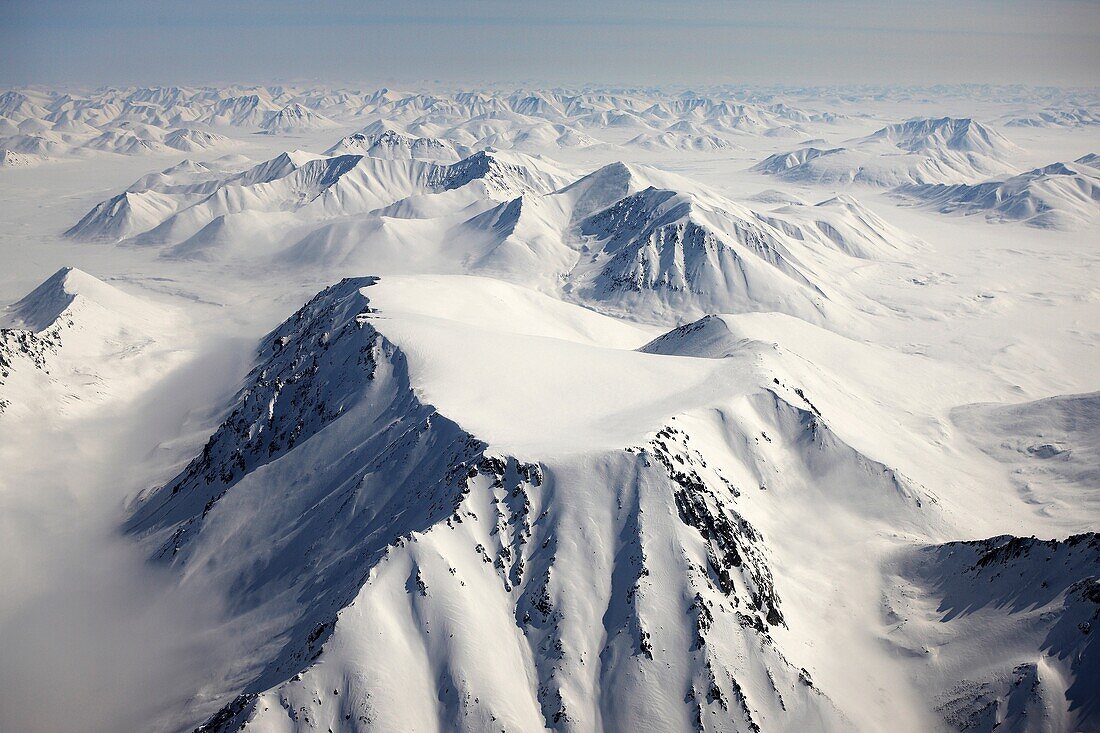 Mountains Around Chukotka Aerial of snow covered mountains between Egvekinot and Anadyr, Sibera, Russsia