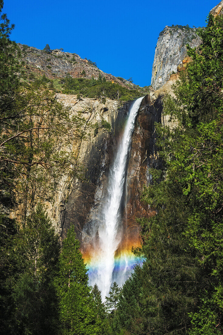 Rainbow over Bridalveil Fall, Yosemite National Park, California USA.