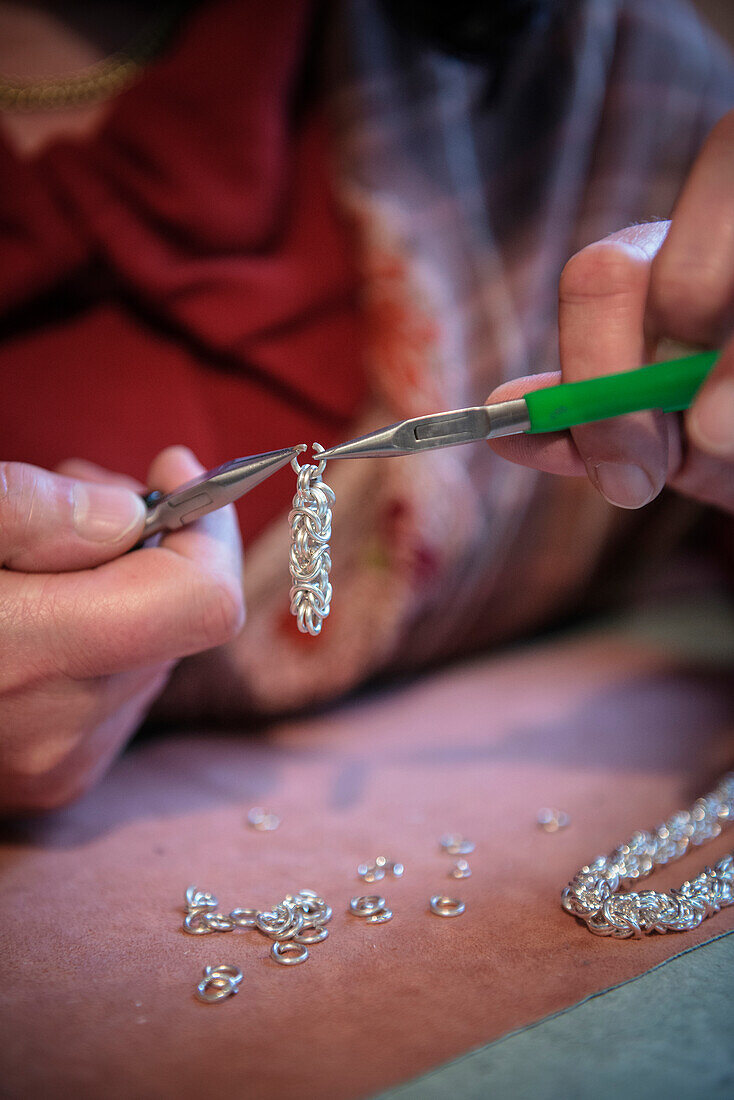 Jeweler making a chain, Vellberg, Schwaebisch Hall, Baden-Wuerttemberg, Germany