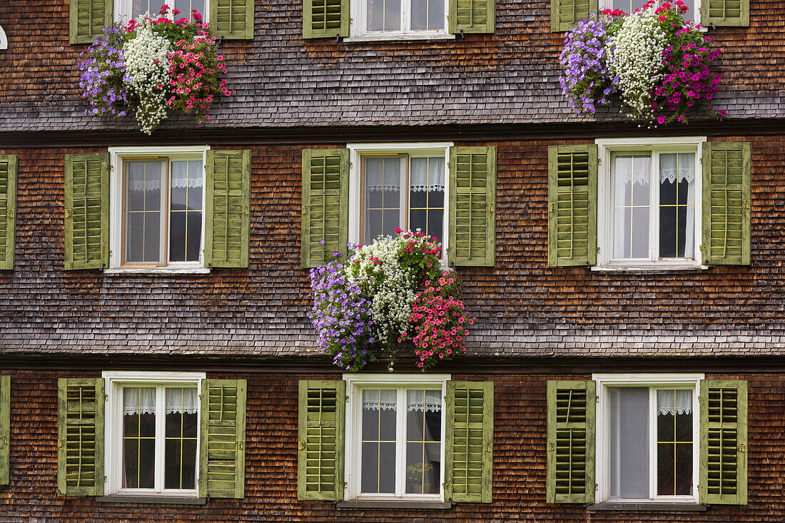 Wooden shingles, facade, window, flowers, Lech, Vorarlberg, Austria