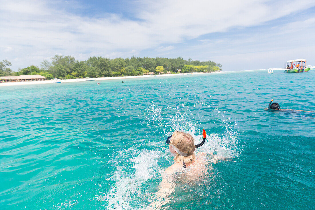 Tourists snorkeling, Gili Meno, Lombok, Indonesia