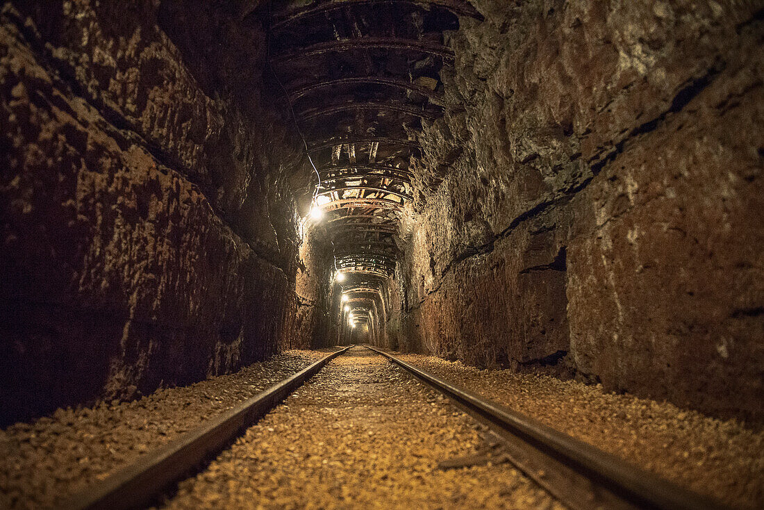 railway tracks in a mining pit, mining pit Tiefer Stollen, Aalen, Ostalb province, Swabian Alb, Baden-Wuerttemberg, Germany