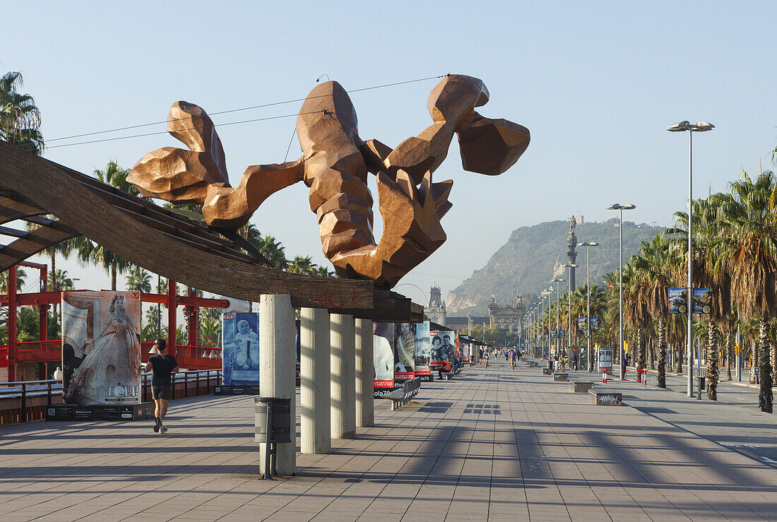 Passeig de Colom, seafront promenade with sculpture La Gamba von Javier Mariscal, 1989, lobster, Mirador do Colom, Columbus Column in the backgrund, Barcelona, Catallunya, Catalonia, Spain, Europe
