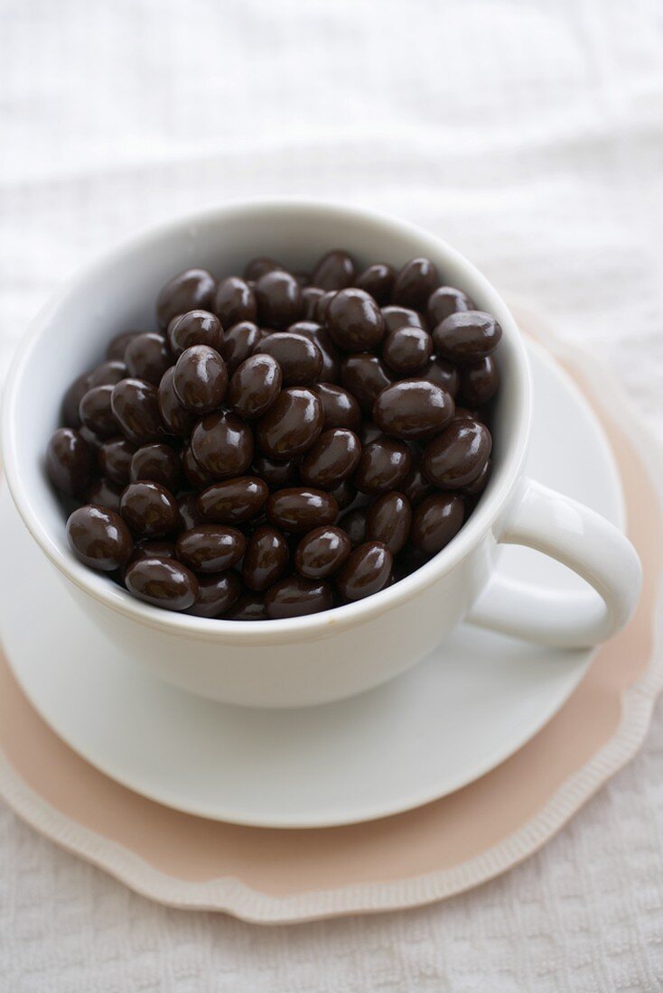 White Coffee Mug Full of Chocolate Covered Espresso Beans