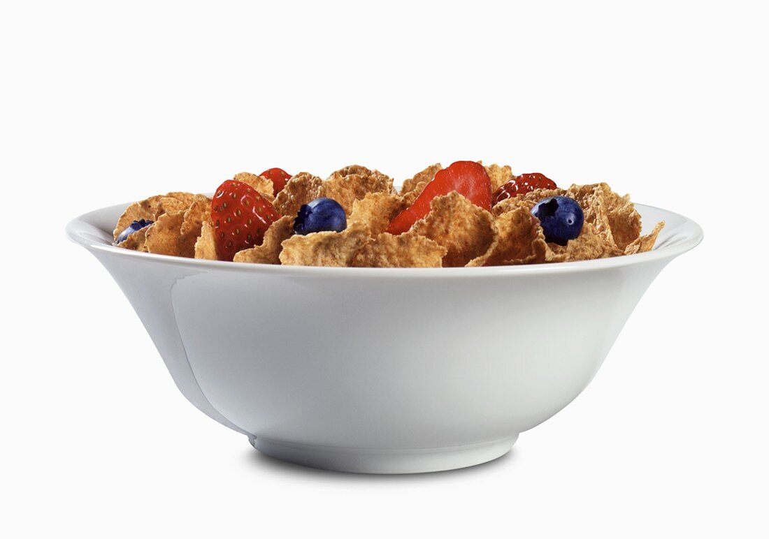 Bowl of Bran Flakes with Strawberries and Blueberries