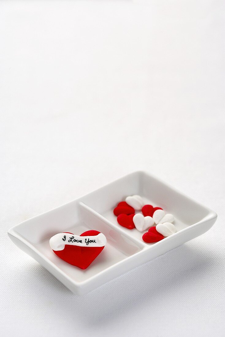 Candy Hearts in a Divided Dish; White Background