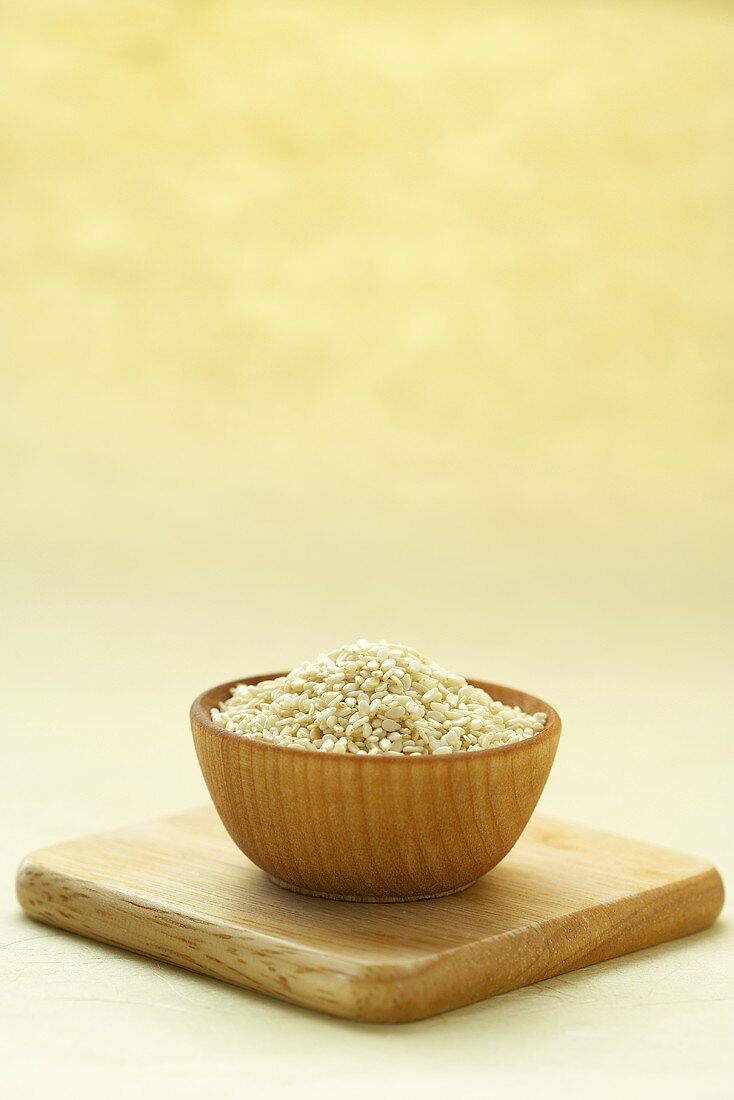 Wooden Bowl of Hulled Sesame Seeds