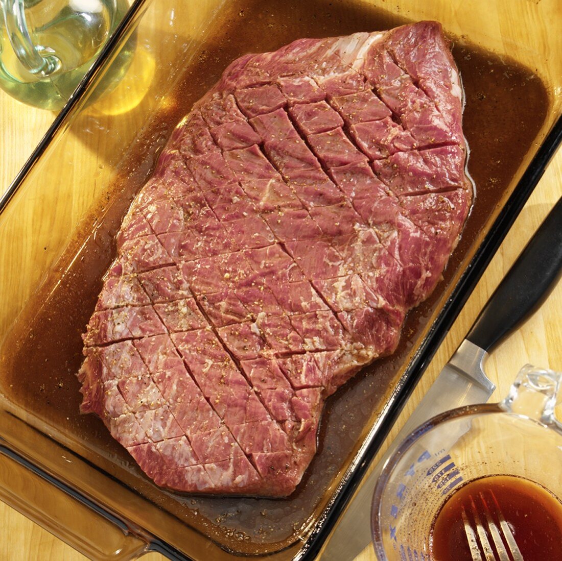 Flank Steak in a Glass Dish with Marinade