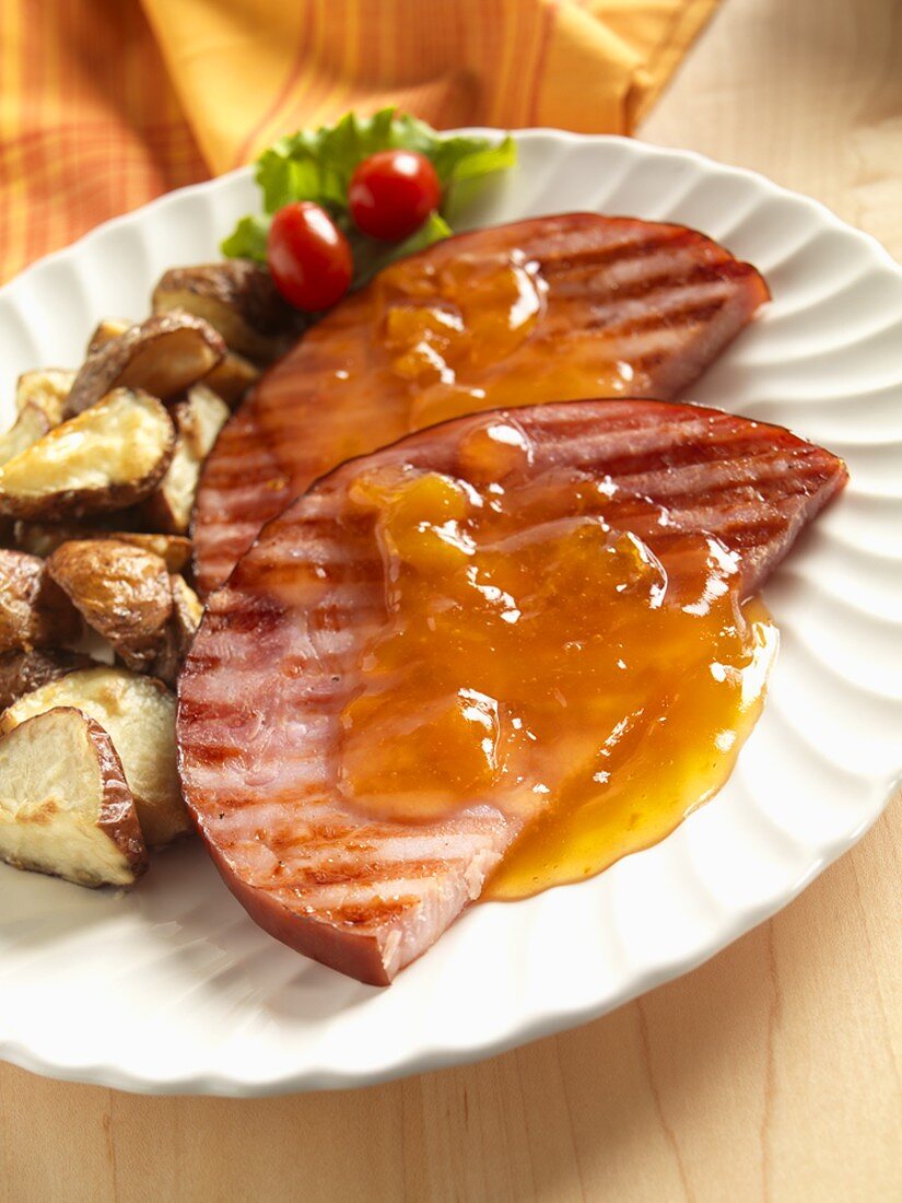 Grilled Ham Steak with Orange Sauce and Potatoes