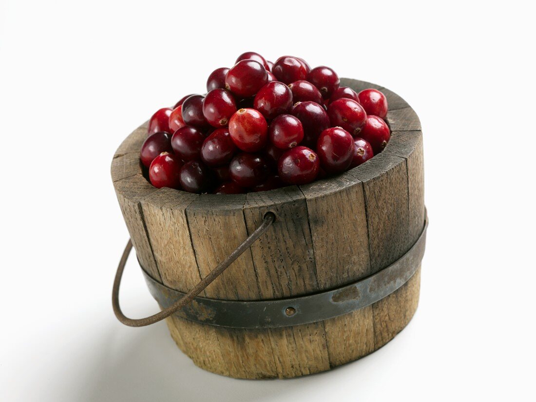 Fresh Cranberries in a Wooden Bucket