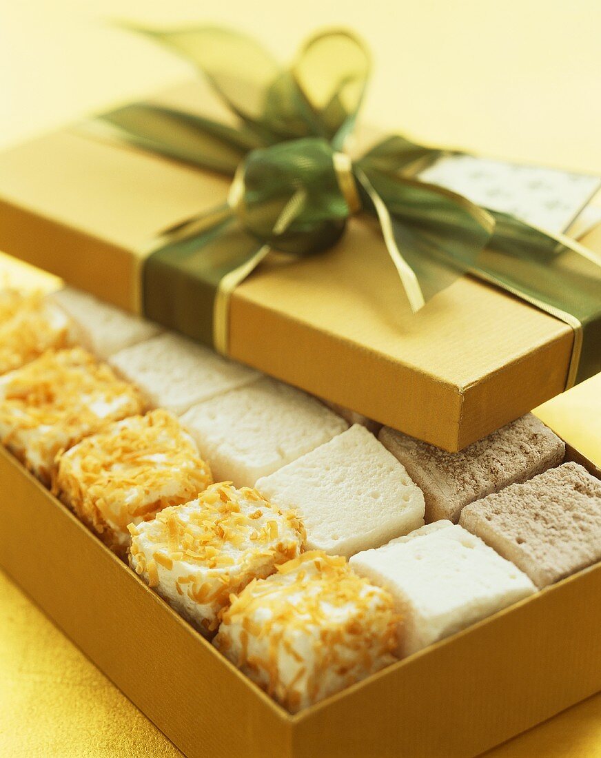Various Marshmallow Candy in a Gold Gift Box with Ribbon, Opened