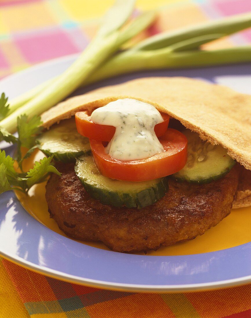 Lamb Burger with Cucumber, Tomato and Yogurt Sauce in Pita Bread