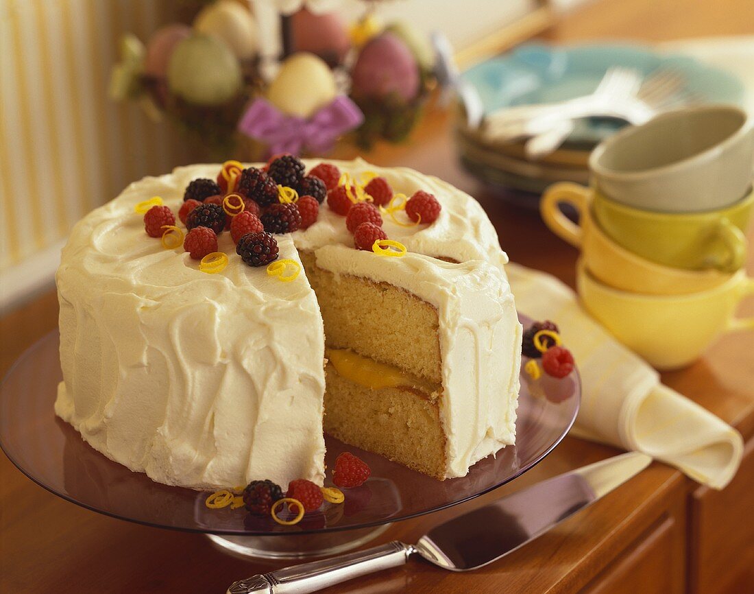 Lemon Layer Cake with Fresh Berries, Slice Removed
