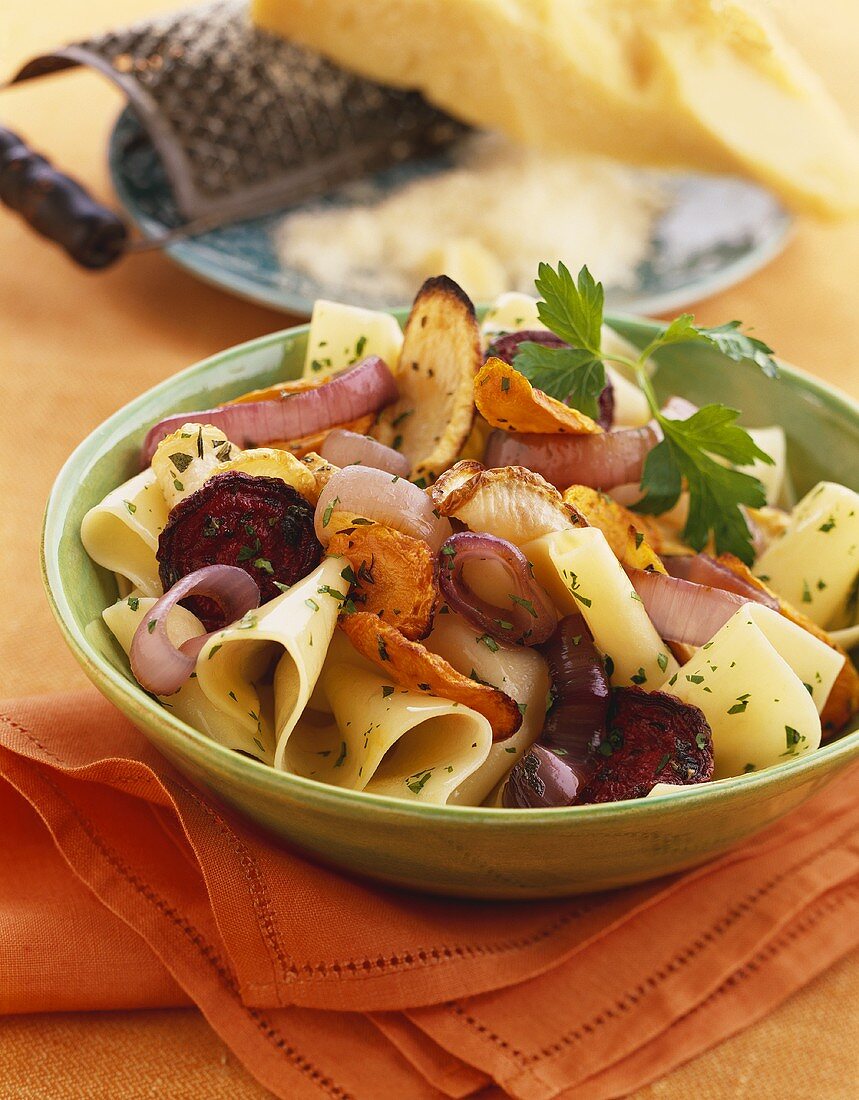 Bowl of Wide Noodles with Roasted Vegetables, Parsley Garnish