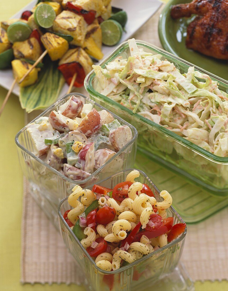 Three Assorted Summer Salads in Glass Containers
