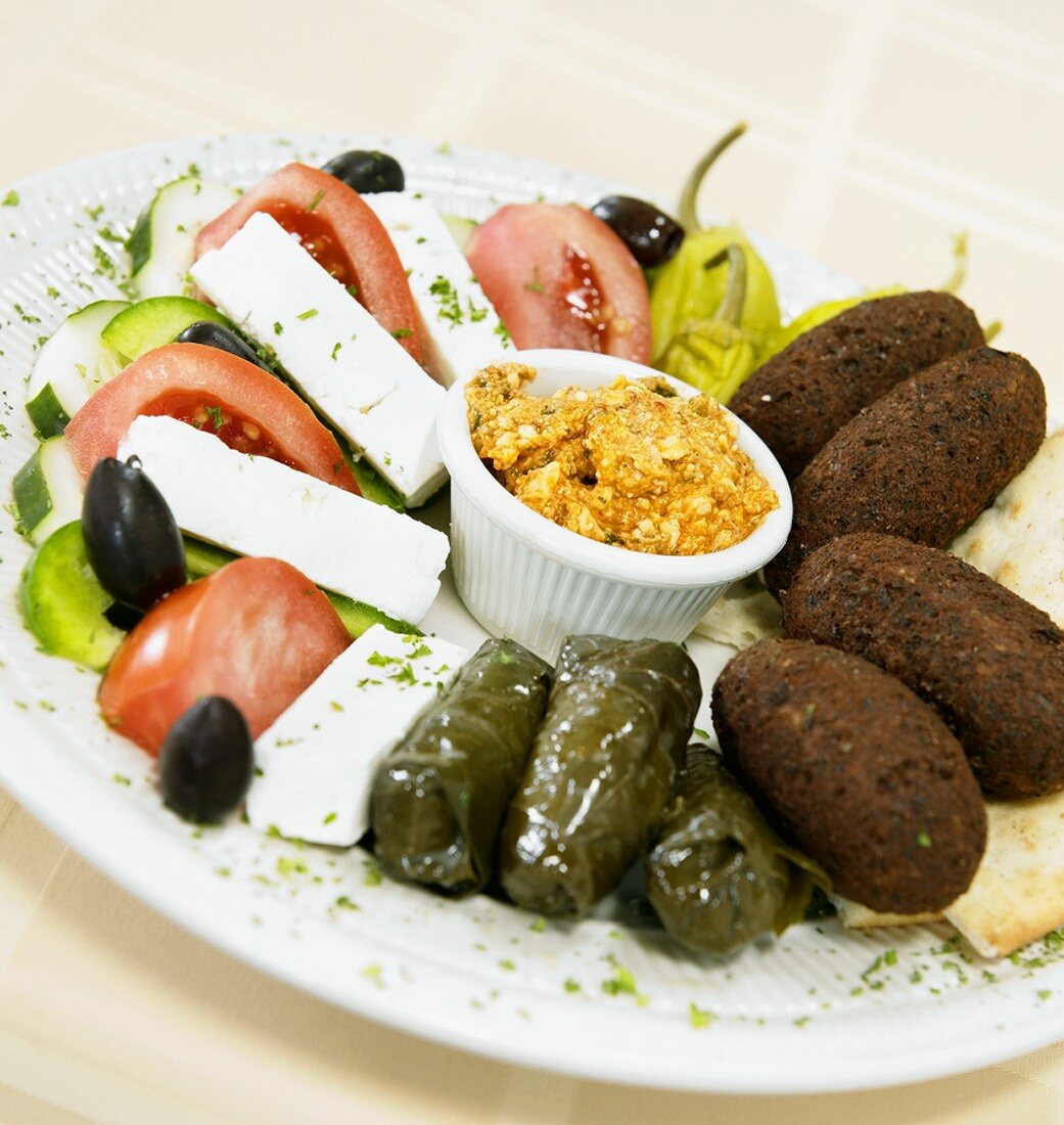 Appetizer Sampler with Dolmades, Falafel and Feta and Tomato Salad