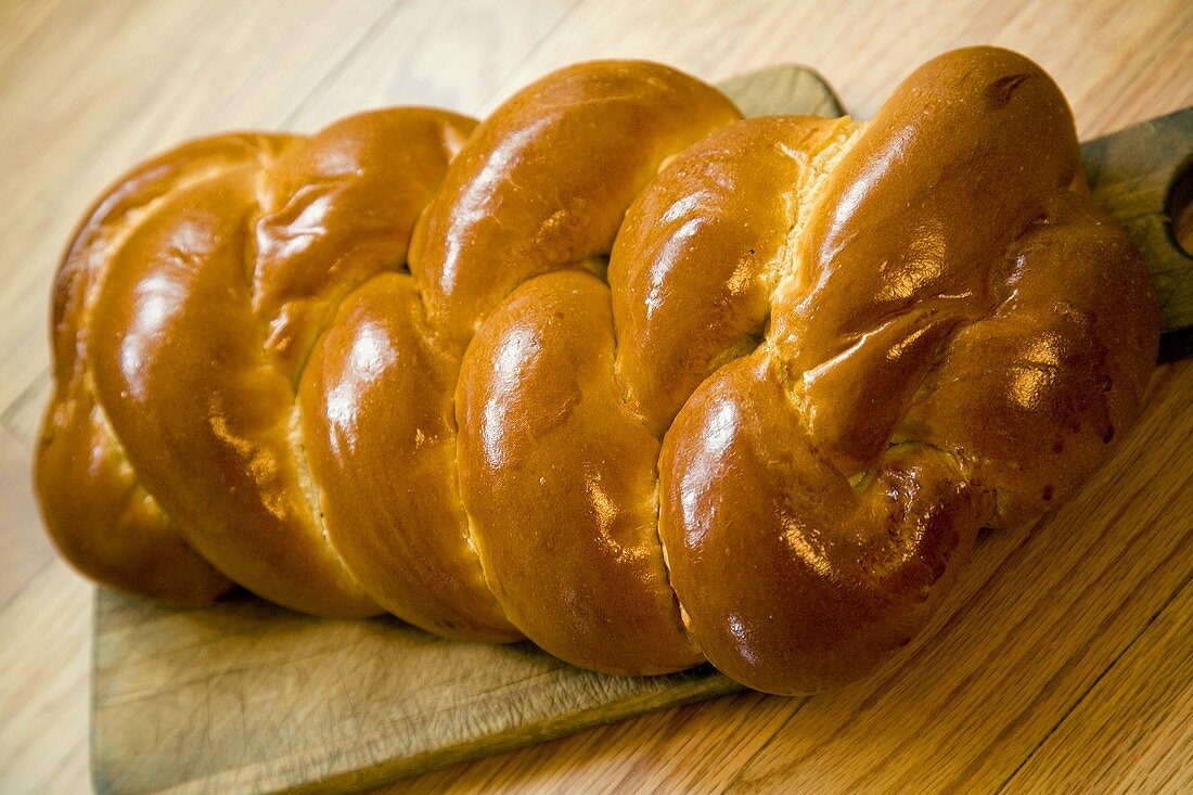 Loaf of Challah Bread on a Cutting Board