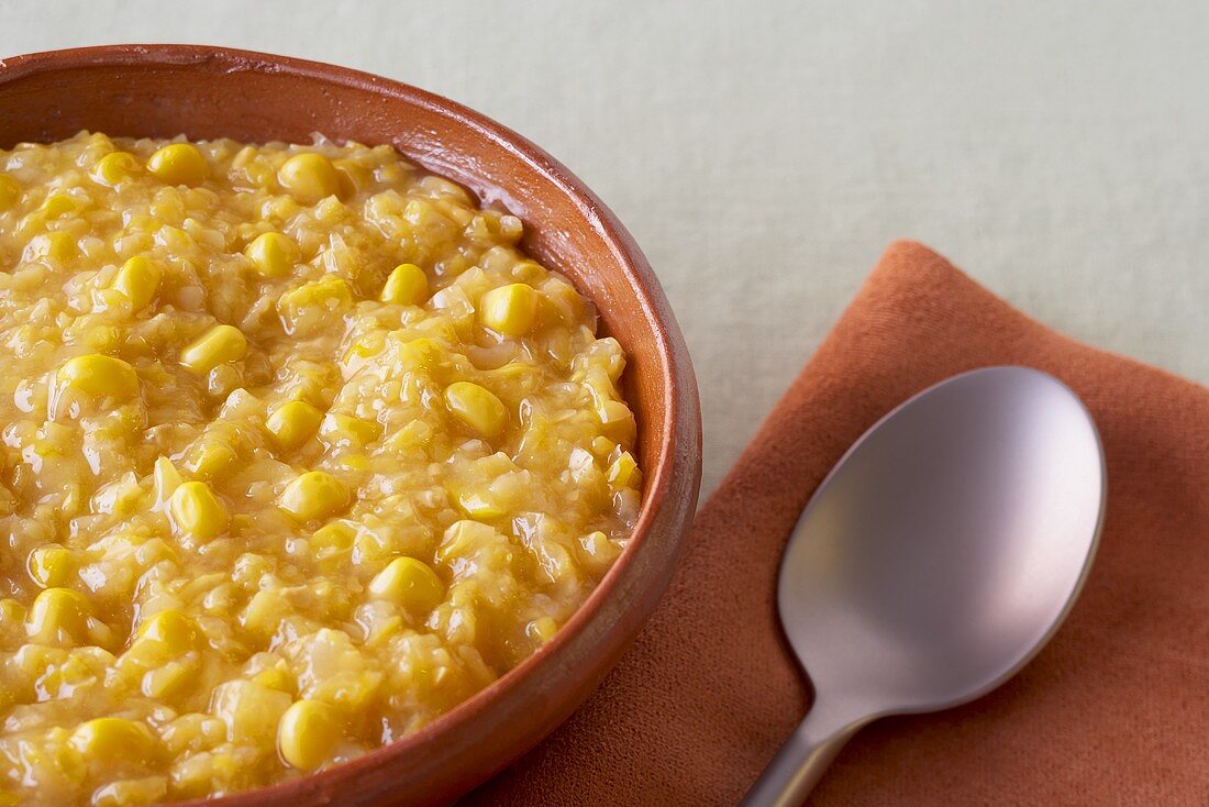 Bowl of Creamed Corn; Spoon