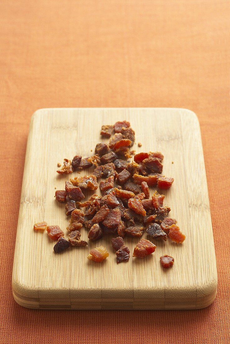 Bacon Bits on a Cutting Board