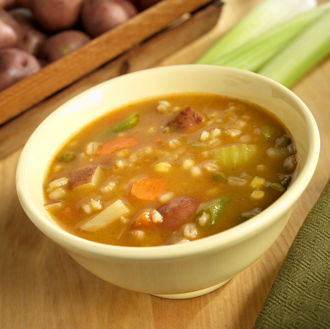 Vegetable Barley Soup in a Yellow Bowl