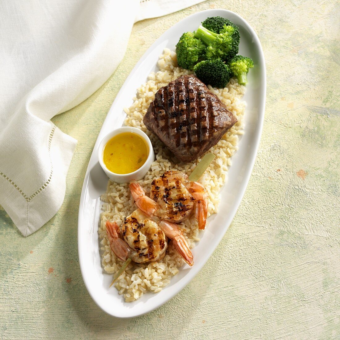 Surf & Turf on Brown Rice with Broccoli; Grilled Shrimp and Steak