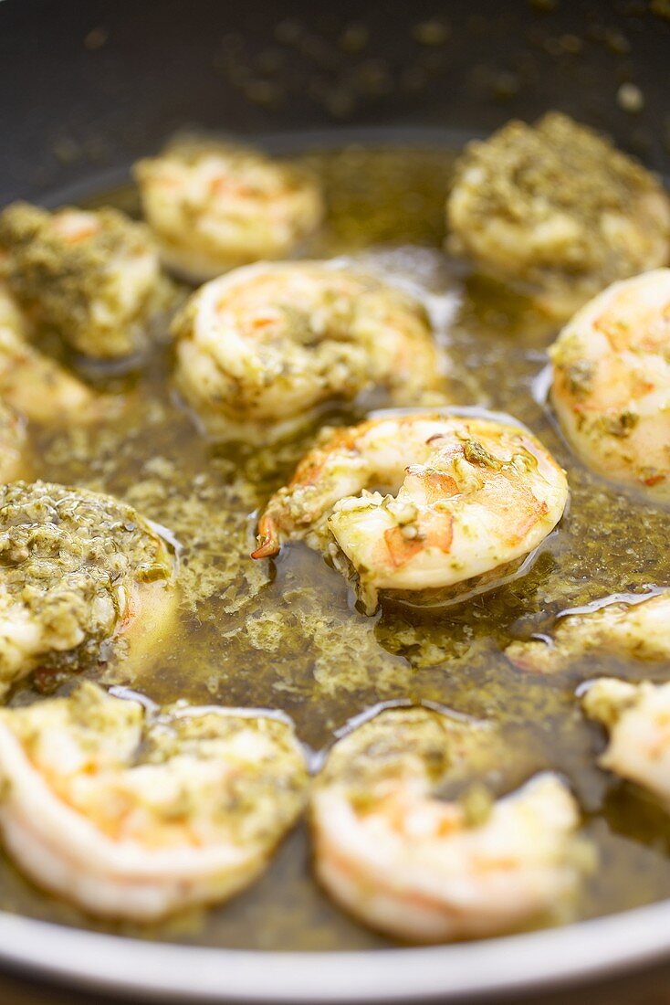 Shrimp and Garlic Simmering in a Frying Pan