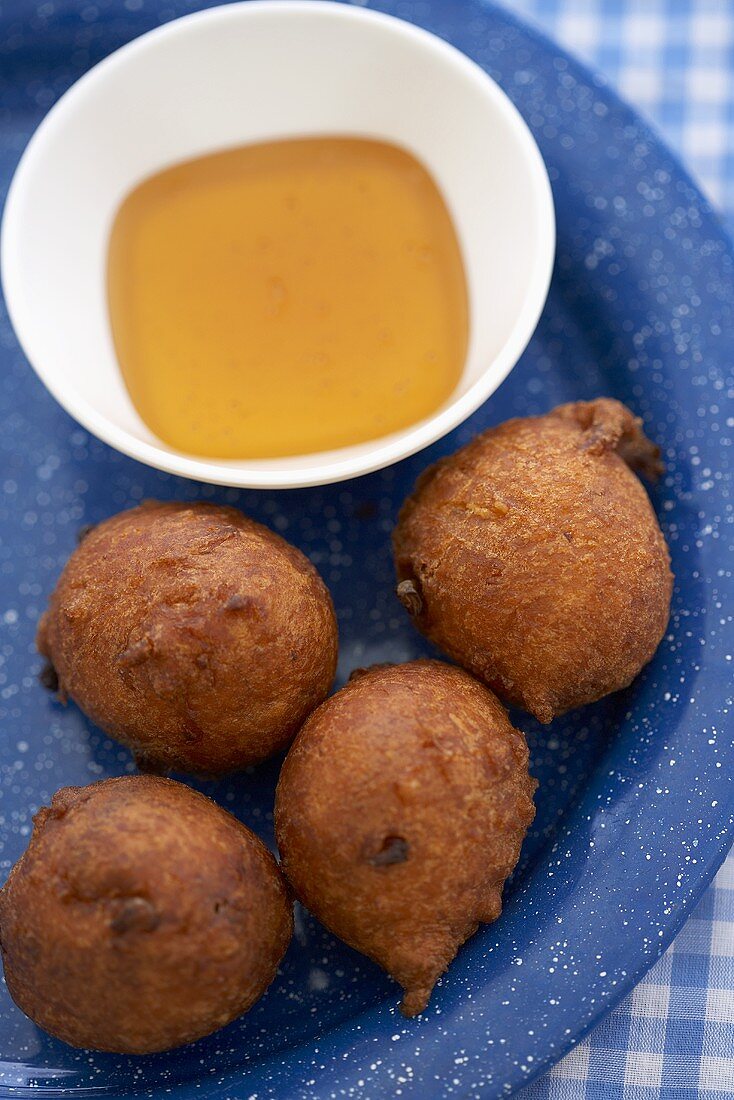Hush Puppies with a Bowl of Honey; Fried Corn Fritters