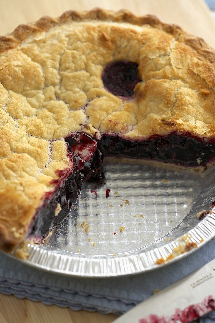 Blueberry Pie with Slices Removed; In Disposable Pie Pan