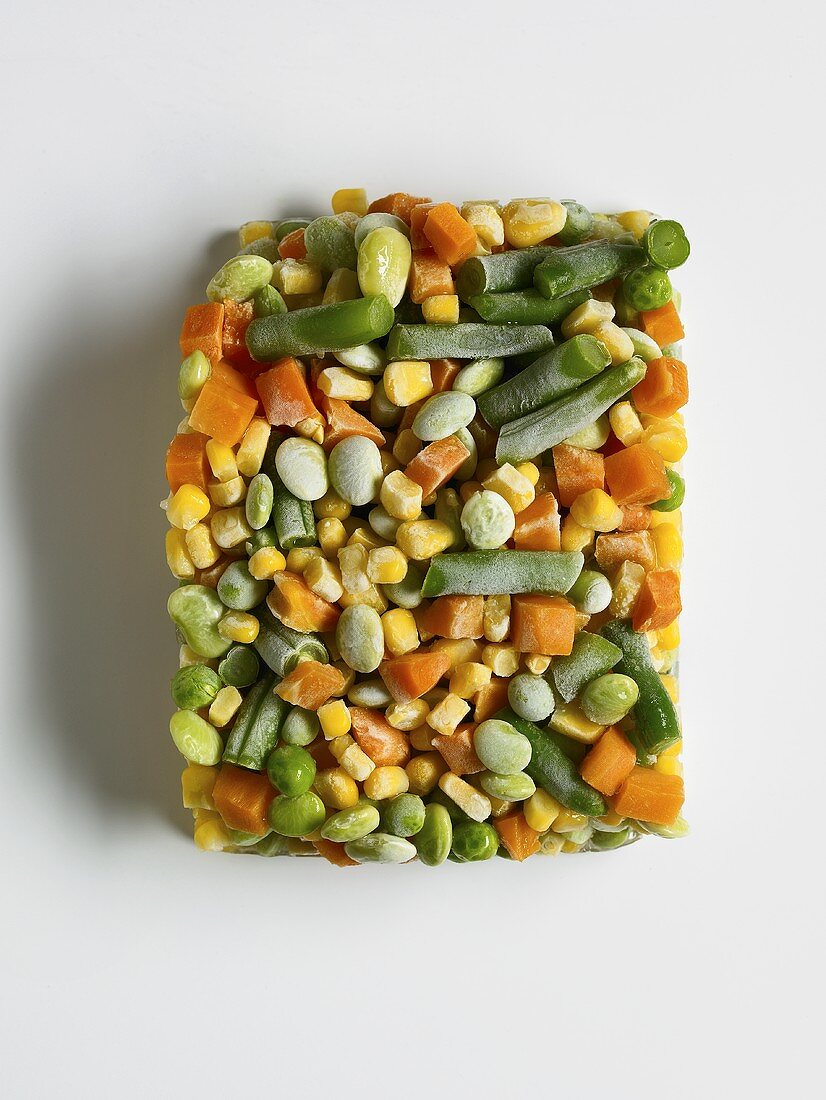 Frozen Mixed Vegetables in a Square Shape on a White Background