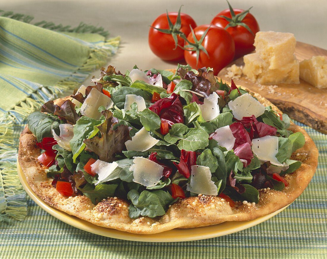 Salad with Shaved Parmesan Cheese on Crispy Flatbread