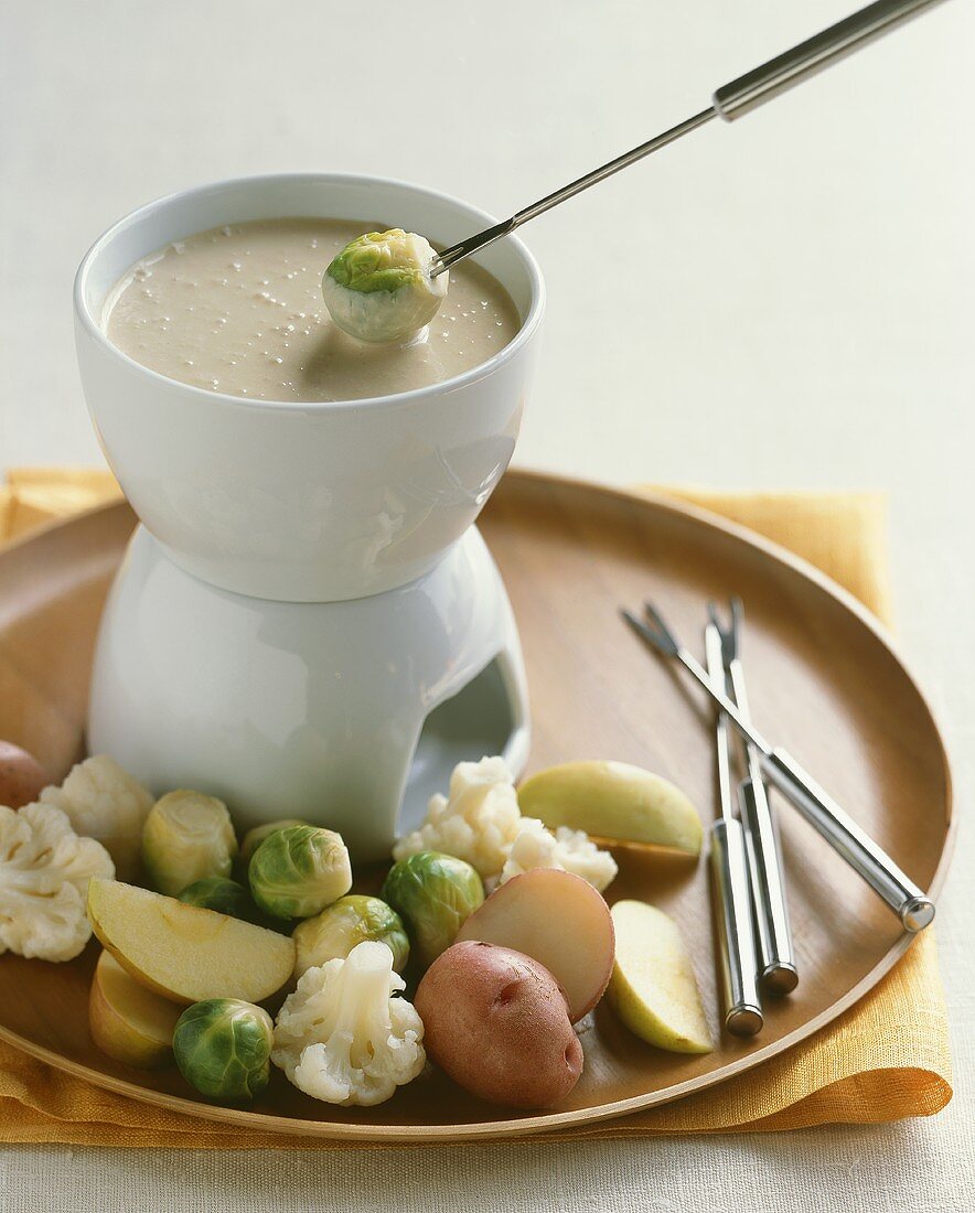 Brussels Sprout Dipping into Fondue