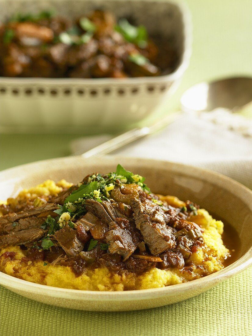 Sliced Pot Roast Over Polenta