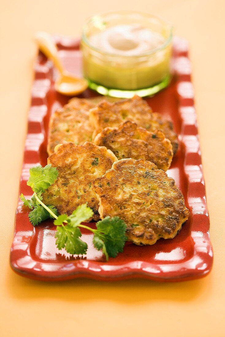 Corn Fritters on a Platter with Parsley Garnish