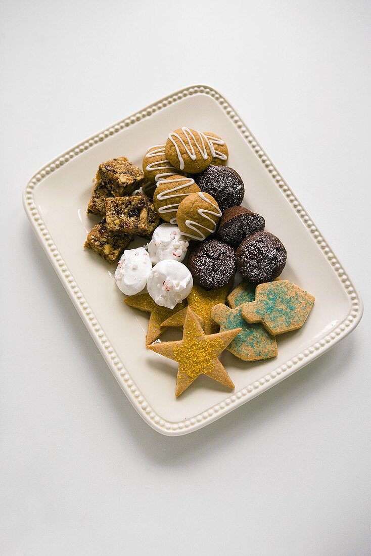 Platter of Assorted Cookies on a White Background; From Above