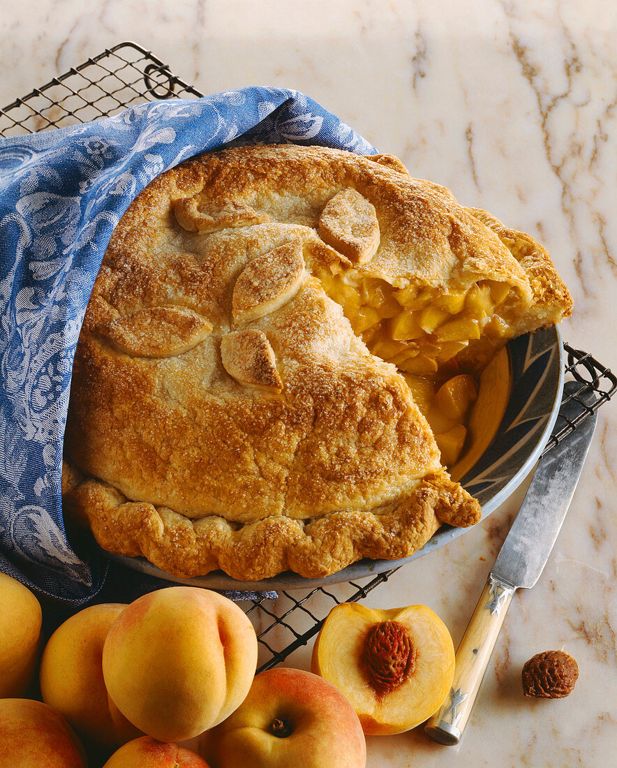High Rise Peach Pie on a Cooling Rack