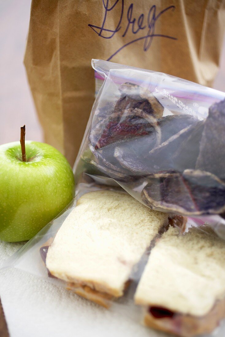Brown Bag Lunch, Peanut Butter and Jelly Sandwich with an Apple