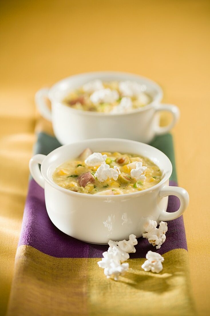 Two Soup Bowls of Corn Chowder with Popcorn
