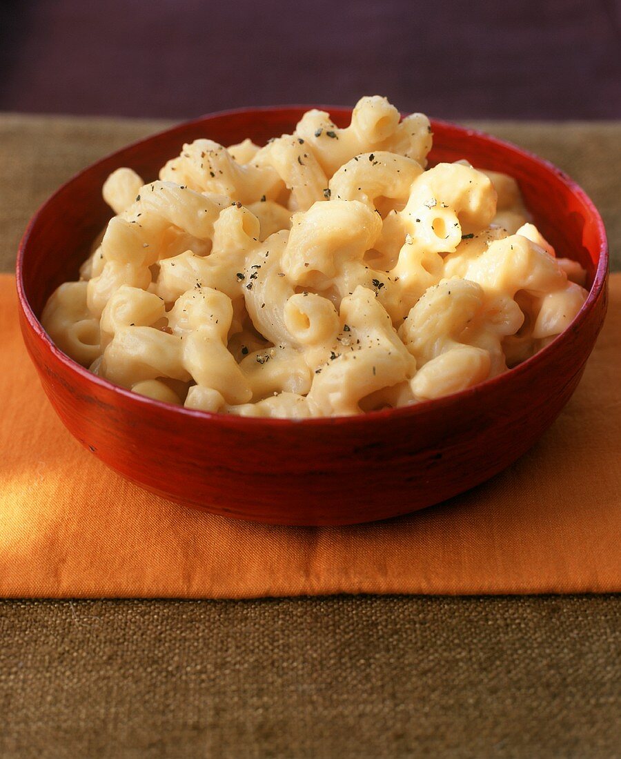 Bowl of Creamy Macaroni and Cheese with Fresh Cracked Pepper